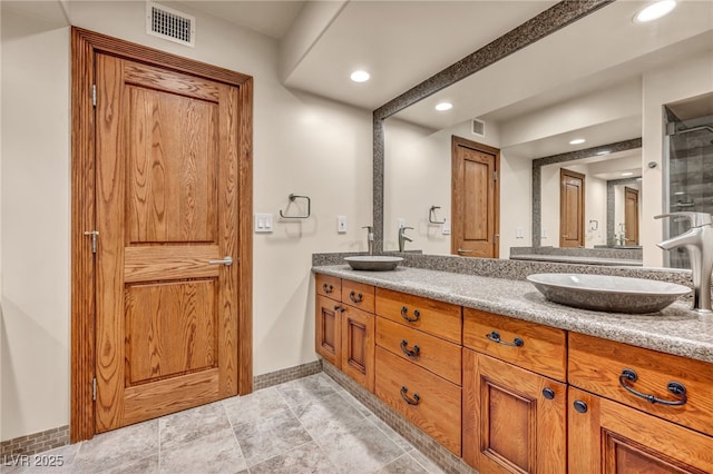 7045 Edna Ave, Las Vegas, NV 89117 - full bath with double vanity and recessed lighting