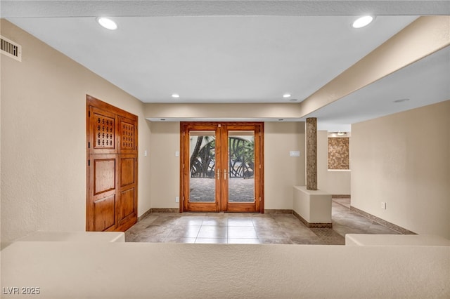 7045 Edna Ave, Las Vegas, NV 89117 - tiled entryway featuring french doors and recessed lighting