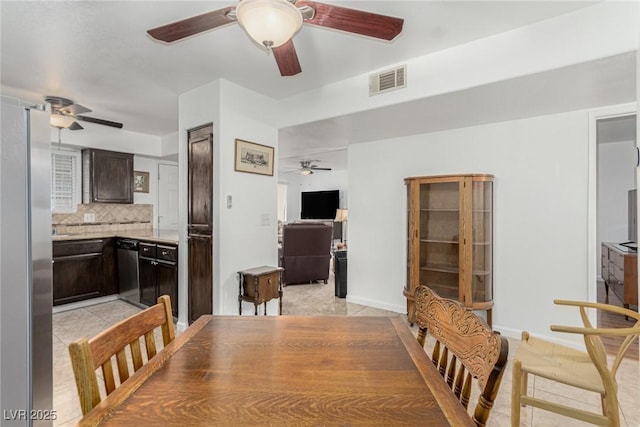 2725 S Nellis Blvd Unit 1037, Las Vegas, NV 89121 - dining space with ceiling fan and light tile patterned floors