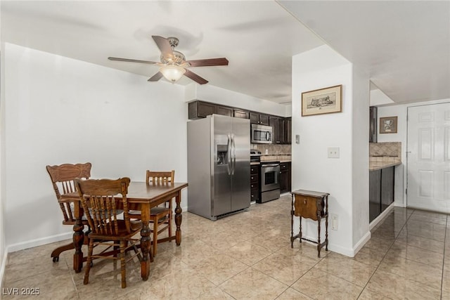 2725 S Nellis Blvd Unit 1037, Las Vegas, NV 89121 - dining area with ceiling fan and light tile patterned flooring