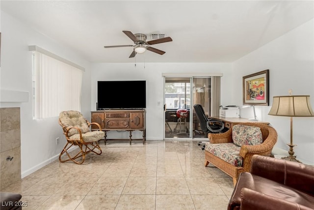 2725 S Nellis Blvd Unit 1037, Las Vegas, NV 89121 - tiled living area featuring ceiling fan and baseboards