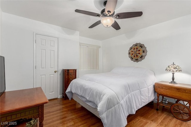2725 S Nellis Blvd Unit 1037, Las Vegas, NV 89121 - bedroom with wood finished floors and a ceiling fan