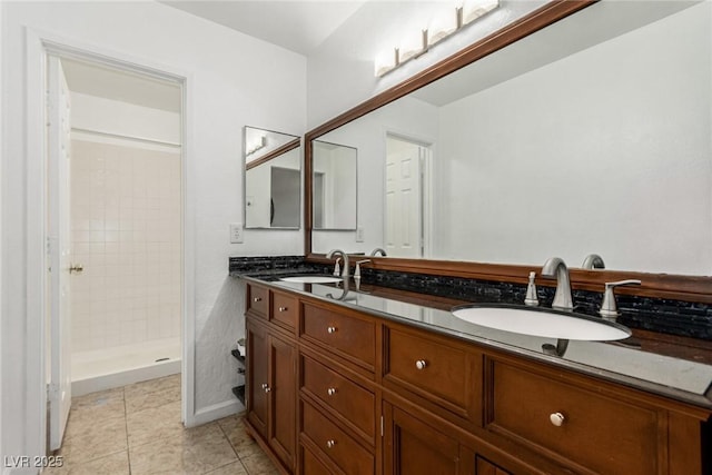 2725 S Nellis Blvd Unit 1037, Las Vegas, NV 89121 - full bathroom featuring double vanity, tiled shower, and tile patterned floors