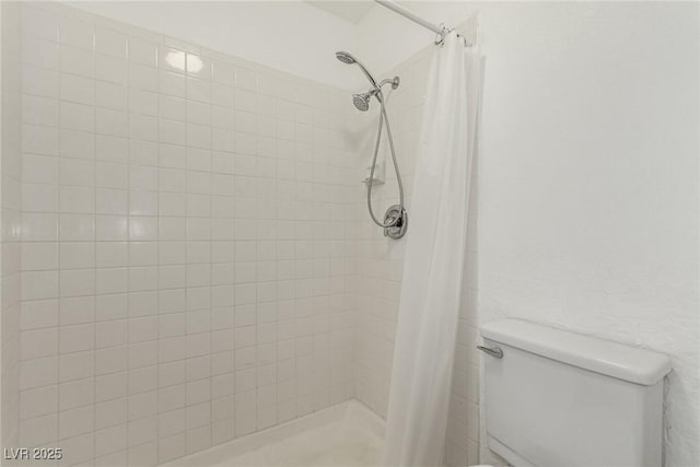 2725 S Nellis Blvd Unit 1037, Las Vegas, NV 89121 - bathroom featuring toilet and tiled shower