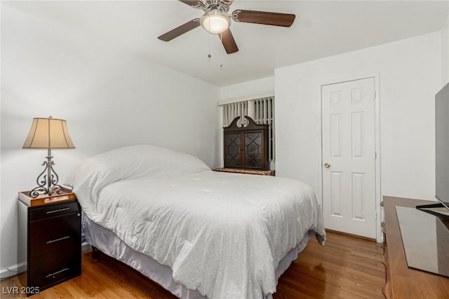 2725 S Nellis Blvd Unit 1037, Las Vegas, NV 89121 - bedroom with wood finished floors and a ceiling fan
