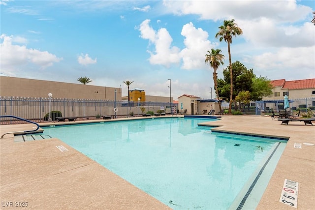 2725 S Nellis Blvd Unit 1037, Las Vegas, NV 89121 - community pool featuring a patio area