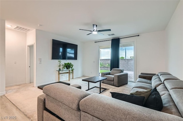 2821 Gaffer Film St, Las Vegas, NV 89156 - living room with a ceiling fan and light colored carpet