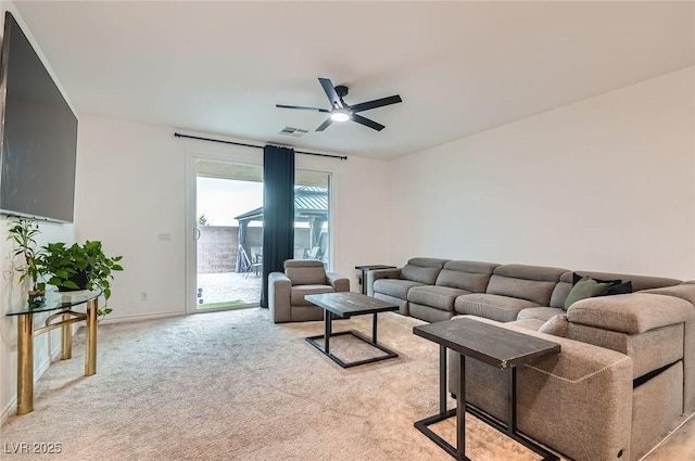2821 Gaffer Film St, Las Vegas, NV 89156 - living area featuring a ceiling fan and light carpet