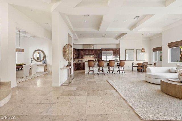 8712 Mesa Canogo Dr, Las Vegas, NV 89148 - living area with a high ceiling, coffered ceiling, and beam ceiling