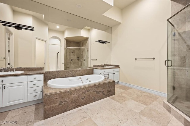 8712 Mesa Canogo Dr, Las Vegas, NV 89148 - full bath featuring a shower stall, a garden tub, and two vanities
