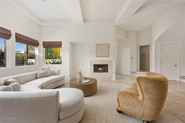 8712 Mesa Canogo Dr, Las Vegas, NV 89148 - living room featuring a fireplace with flush hearth and beam ceiling