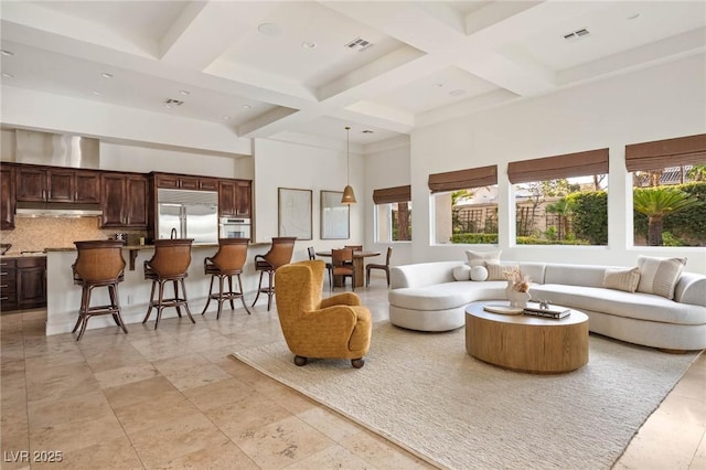 8712 Mesa Canogo Dr, Las Vegas, NV 89148 - living area featuring a high ceiling, coffered ceiling, and beam ceiling