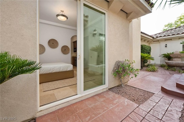 8712 Mesa Canogo Dr, Las Vegas, NV 89148 - doorway to property with stucco siding and a patio