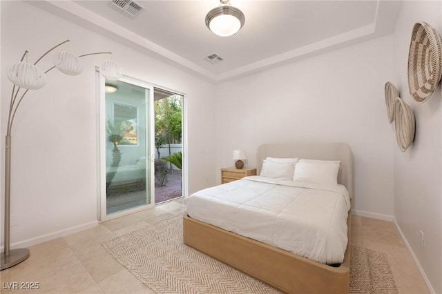 8712 Mesa Canogo Dr, Las Vegas, NV 89148 - bedroom with access to exterior and a tray ceiling