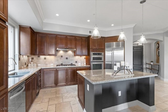30 Via Mantova Unit 202, Henderson, NV 89011 - kitchen featuring appliances with stainless steel finishes, decorative backsplash, arched walkways, light stone countertops, and stone tile floors