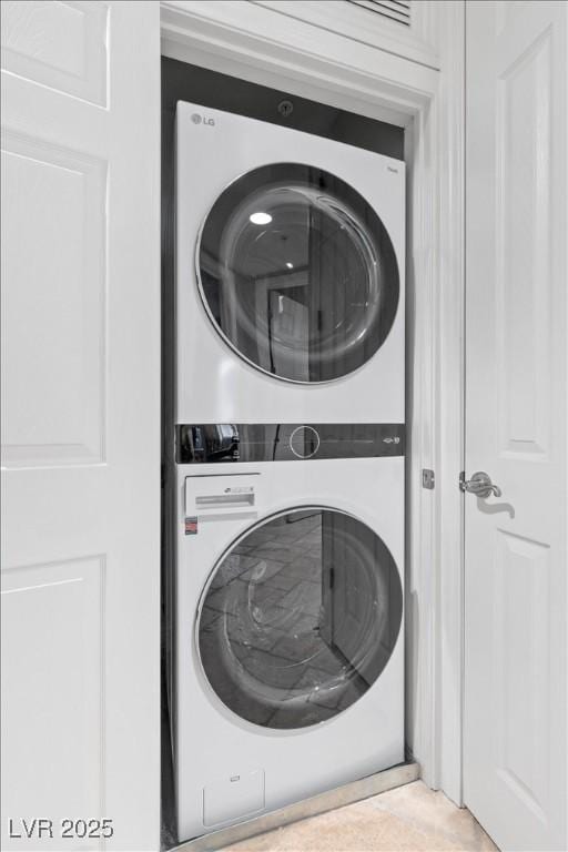 30 Via Mantova Unit 202, Henderson, NV 89011 - washroom featuring stacked washer / drying machine