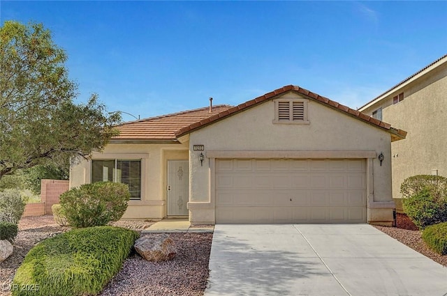 1213 Bistro Bay Ave, North Las Vegas, NV 89086 - view of front facade with a garage, driveway, stucco siding, and a tiled roof