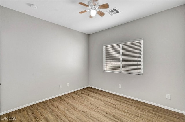 1213 Bistro Bay Ave, North Las Vegas, NV 89086 - unfurnished room with wood finished floors and a ceiling fan