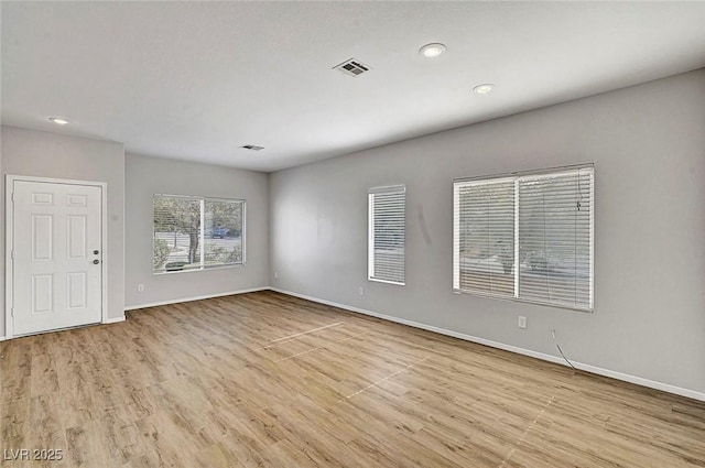 1213 Bistro Bay Ave, North Las Vegas, NV 89086 - empty room featuring wood finished floors and recessed lighting