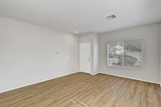 1213 Bistro Bay Ave, North Las Vegas, NV 89086 - empty room with wood finished floors and baseboards