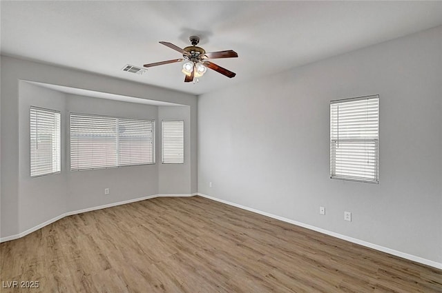 1213 Bistro Bay Ave, North Las Vegas, NV 89086 - unfurnished room with a ceiling fan and wood finished floors