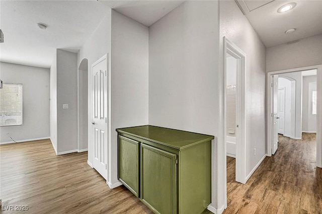 1213 Bistro Bay Ave, North Las Vegas, NV 89086 - hallway with wood finished floors and arched walkways