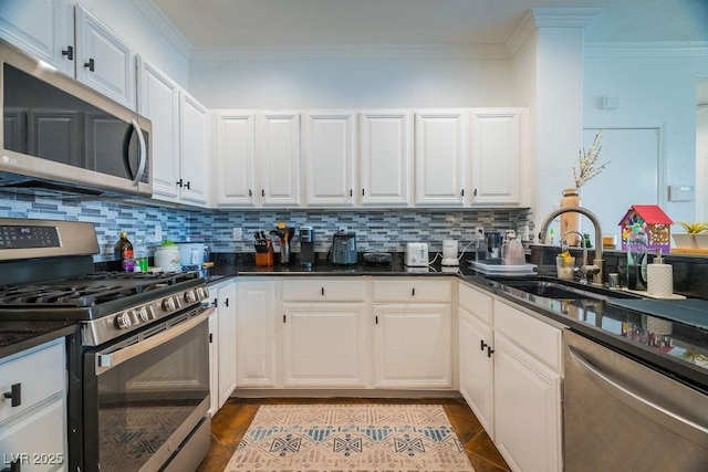 2251 Vangogh Dr, Henderson, NV 89074 - kitchen with appliances with stainless steel finishes, tasteful backsplash, ornamental molding, and white cabinetry