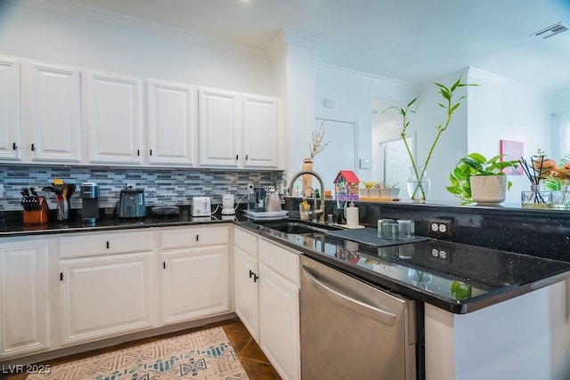 2251 Vangogh Dr, Henderson, NV 89074 - kitchen with stainless steel dishwasher, ornamental molding, a peninsula, decorative backsplash, and white cabinetry