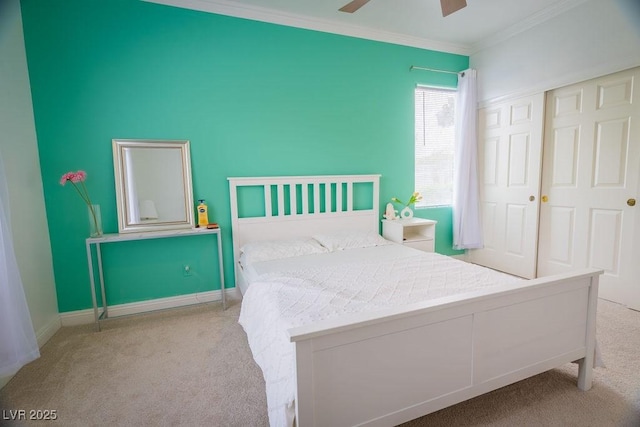 2251 Vangogh Dr, Henderson, NV 89074 - bedroom with carpet, crown molding, a closet, and a ceiling fan