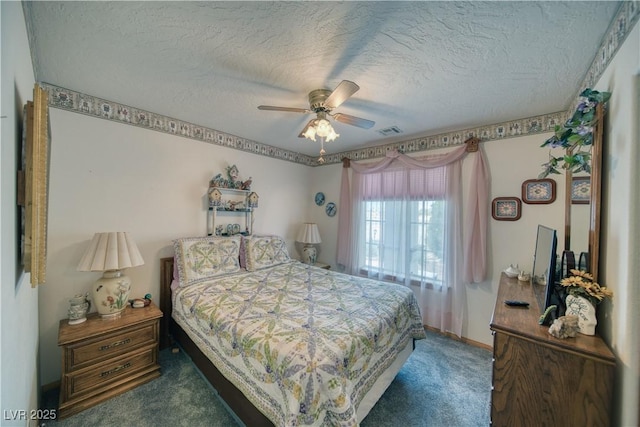 2910 Sunset St, Pahrump, NV 89060 - bedroom with carpet, a textured ceiling, and ceiling fan