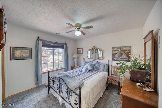 2910 Sunset St, Pahrump, NV 89060 - carpeted bedroom featuring a textured ceiling and ceiling fan
