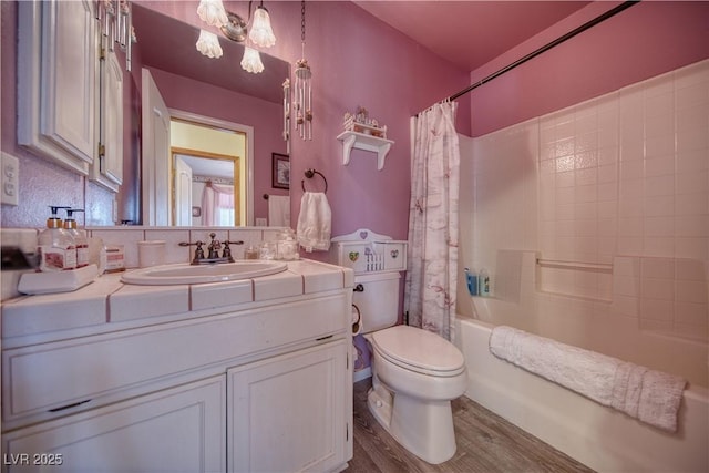2910 Sunset St, Pahrump, NV 89060 - full bath with vanity, shower / bath combination with curtain, and wood finished floors