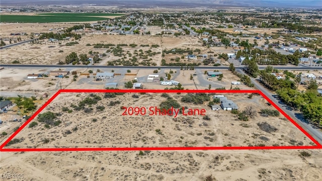 2090 Shady Ln, Pahrump, NV 89060 - aerial overview of property's location with property boundaries highlighted and rural landscape