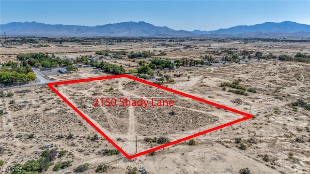 2090 Shady Ln, Pahrump, NV 89060 - aerial view of sparsely populated area with property parcel outlined and mountains