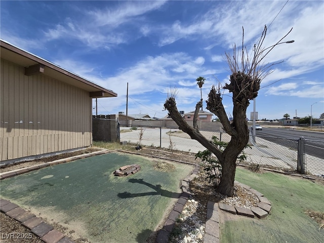 2212 Revere St, North Las Vegas, NV 89030 - view of yard with a putting green
