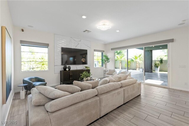 6234 Amber View St, Las Vegas, NV 89135 - living room featuring recessed lighting and wood tiled floors