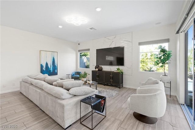 6234 Amber View St, Las Vegas, NV 89135 - living area with plenty of natural light, recessed lighting, and light wood finished floors