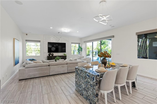 6234 Amber View St, Las Vegas, NV 89135 - living room with plenty of natural light, wood finish floors, a chandelier, and recessed lighting