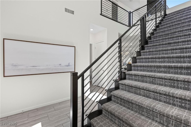 6234 Amber View St, Las Vegas, NV 89135 - staircase with wood finish floors and baseboards