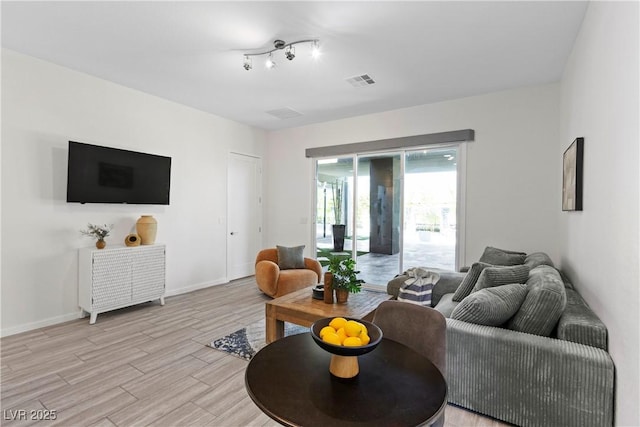 6234 Amber View St, Las Vegas, NV 89135 - living area featuring light wood-type flooring and baseboards