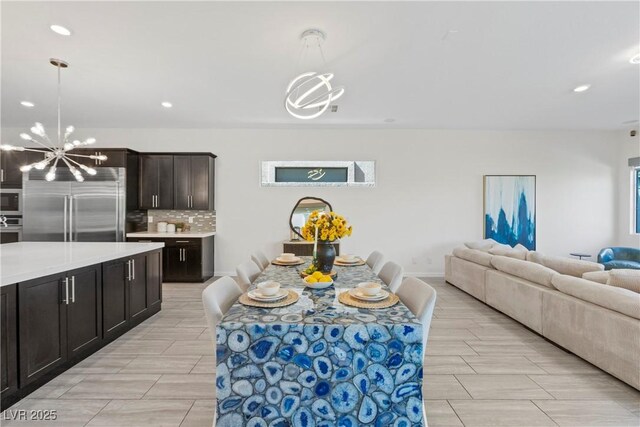 6234 Amber View St, Las Vegas, NV 89135 - dining area with a chandelier and recessed lighting