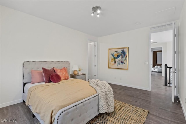 6234 Amber View St, Las Vegas, NV 89135 - bedroom featuring dark wood-type flooring and baseboards
