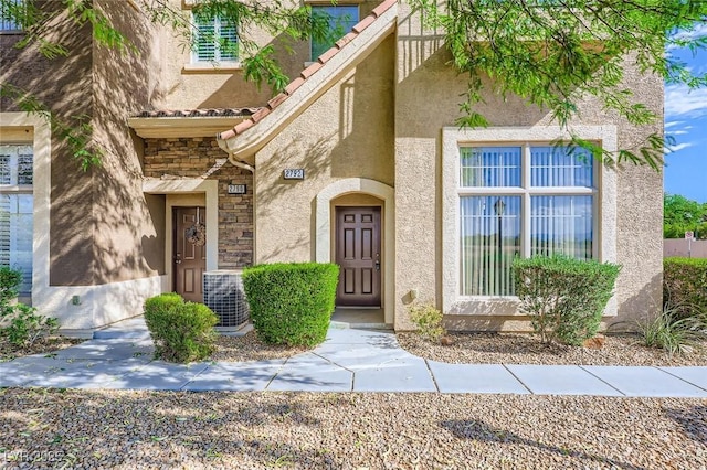 2792 Fountain Ridge Ln, Henderson, NV 89074 - property entrance featuring stucco siding and stone siding