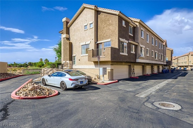2792 Fountain Ridge Ln, Henderson, NV 89074 - view of property with a garage