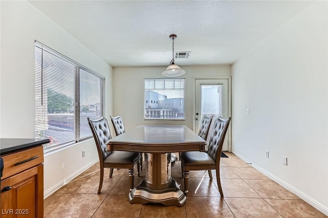 2792 Fountain Ridge Ln, Henderson, NV 89074 - dining area featuring light tile patterned floors and baseboards