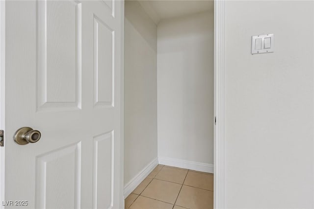 7000 Paddington Way, Las Vegas, NV 89147 - corridor featuring light tile patterned floors and baseboards