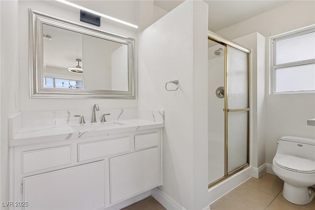 7000 Paddington Way, Las Vegas, NV 89147 - bathroom featuring a shower stall, vanity, and healthy amount of natural light