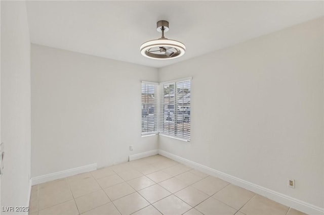 7000 Paddington Way, Las Vegas, NV 89147 - empty room with light tile patterned floors and a ceiling fan