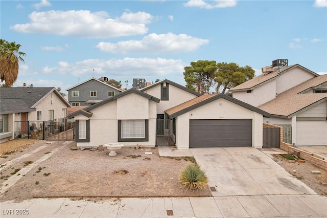 7000 Paddington Way, Las Vegas, NV 89147 - view of front of home featuring a gate, a garage, stucco siding, driveway, and a residential view
