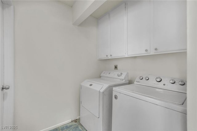 1676 Divinity St, Las Vegas, NV 89142 - laundry room featuring cabinet space, washing machine and dryer, and light tile patterned floors